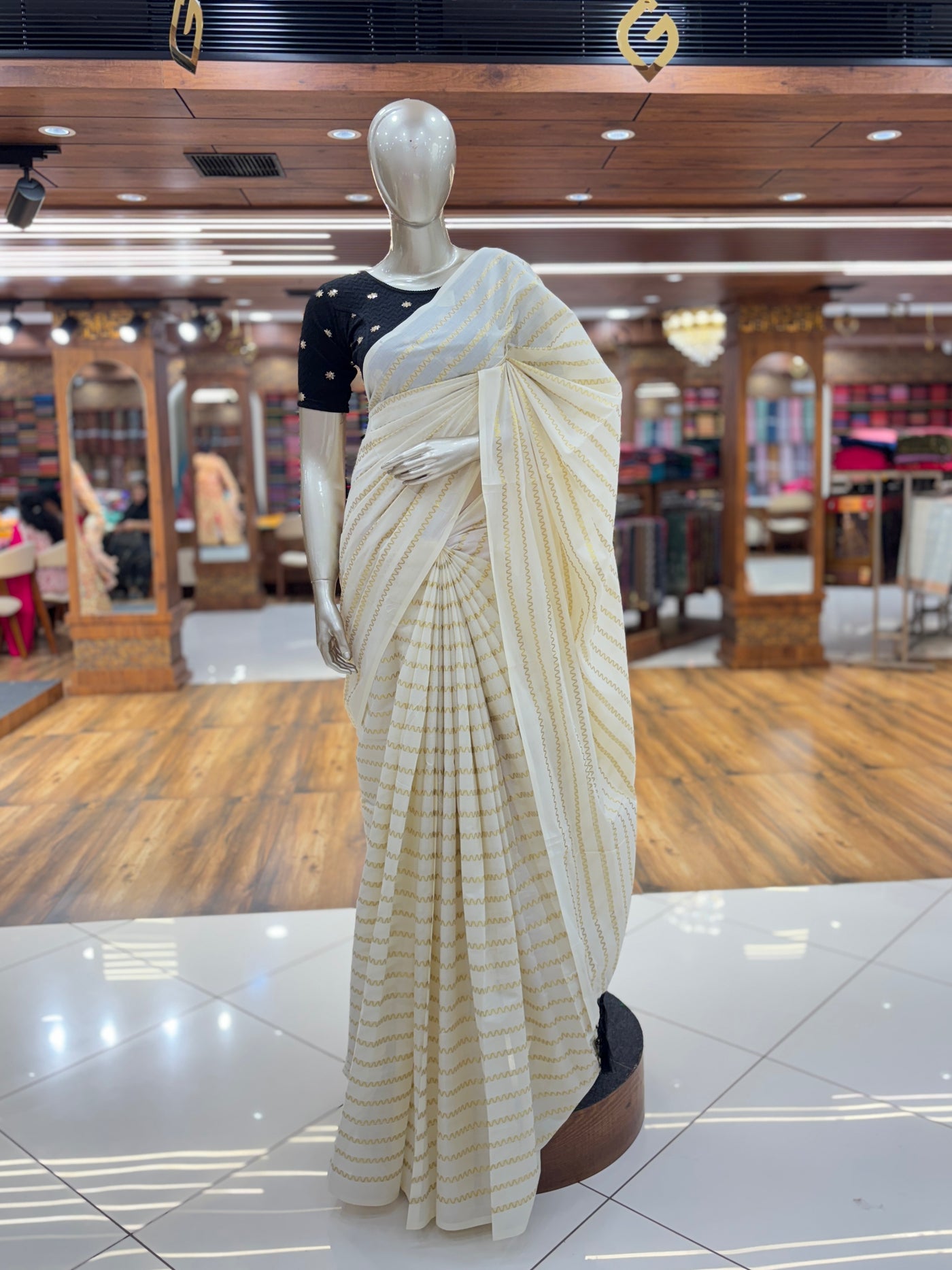 Off-White Cotton Borderless | Set Kerala Kasavu Saree | Zig-Zag Gold Stripes | with Black Tassels on Pallu