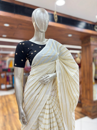 Off-White Cotton Borderless | Set Kerala Kasavu Saree | Zig-Zag Gold Stripes | with Black Tassels on Pallu