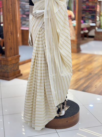 Off-White Cotton Borderless | Set Kerala Kasavu Saree | Zig-Zag Gold Stripes | with Black Tassels on Pallu