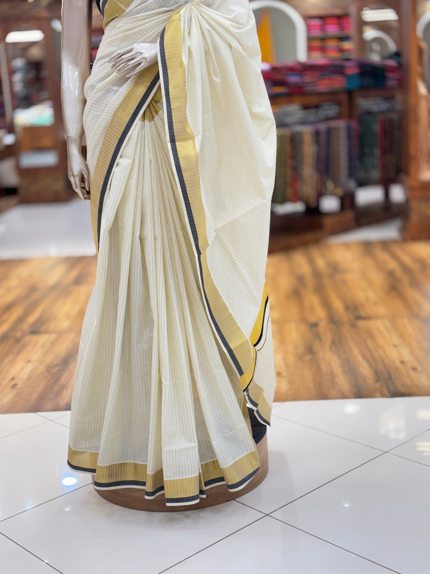 Off White Cotton Set Kerala Kasavu Saree | Golden Stripes on the body | with Dual Black highlights and Kasavu borders