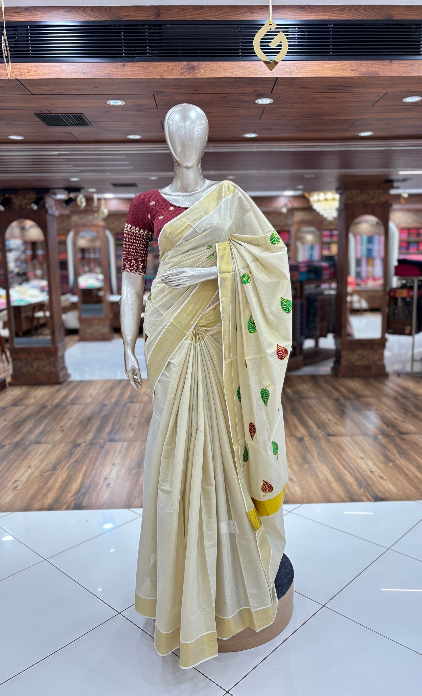 Golden Tissue Silk Saree | Red & Green Leaf Embroidered | with Zari Border