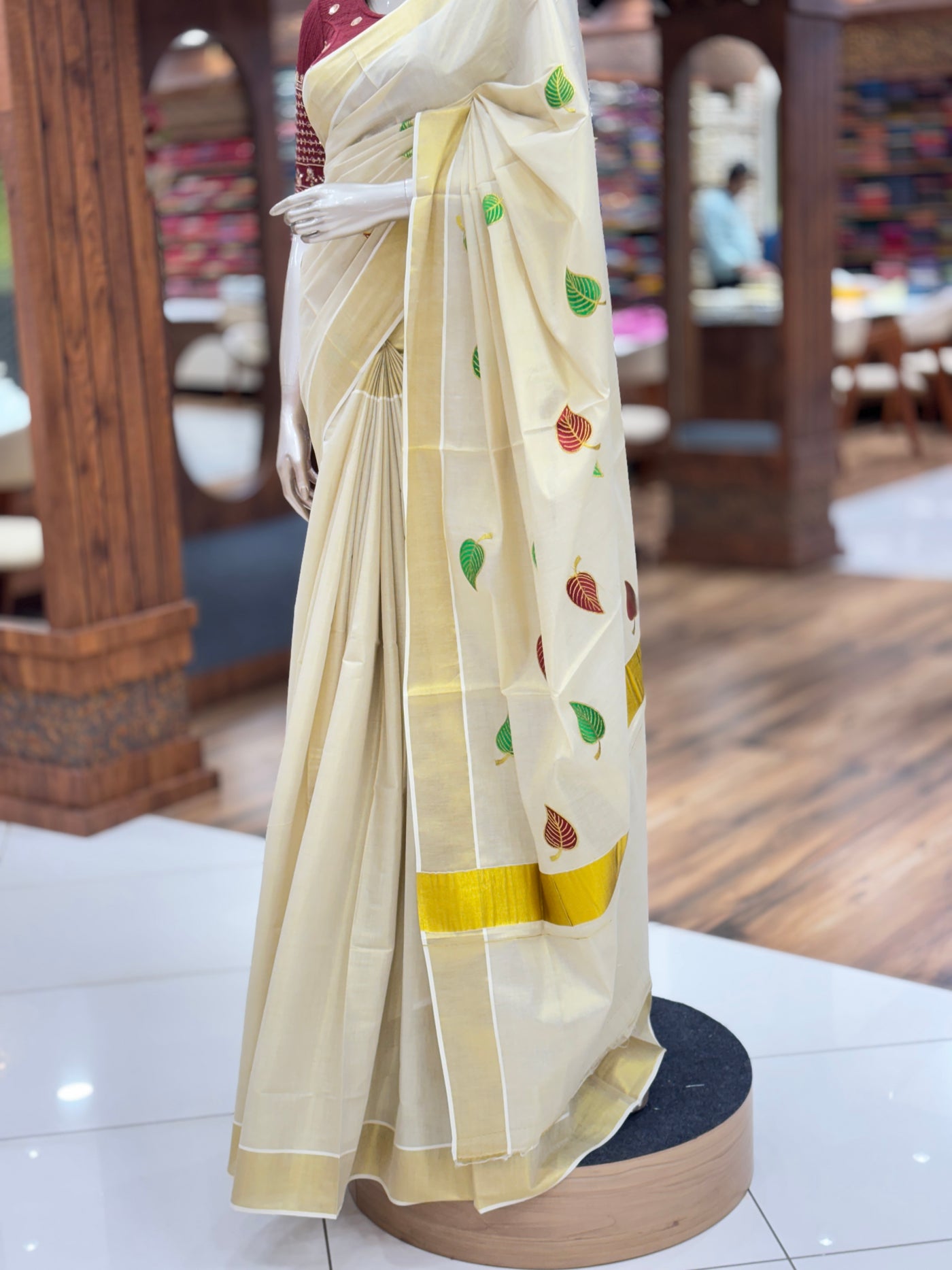 Golden Tissue Silk Saree | Red & Green Leaf Embroidered | with Zari Border